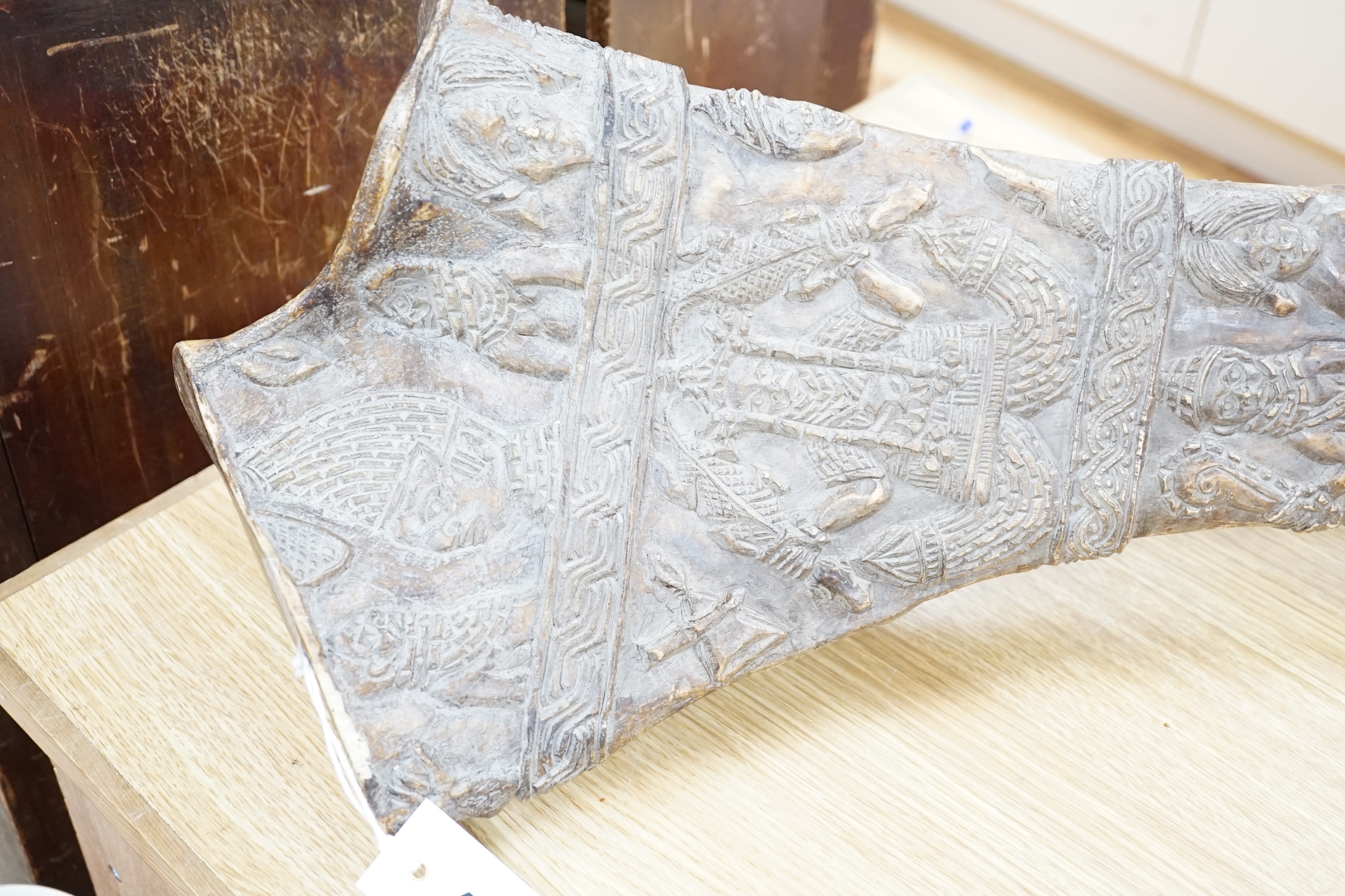 An unusual Benin-style carved elephant femur, Nigeria, 73cm high